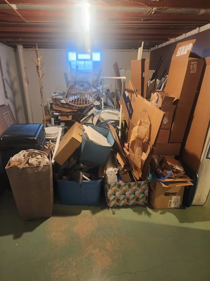 Roll-off dumpster container at job site for 2 Yard Dumpster Rental in Victoria